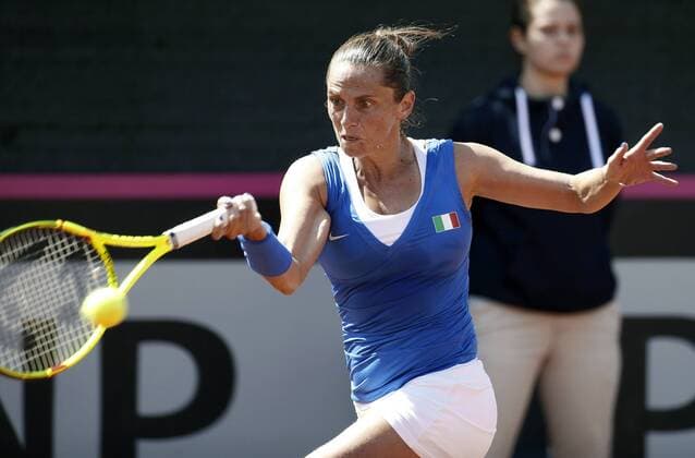 Italian Federation Cup team s member Roberta Vinci hits the ball against Spaniard Garbine Muguruza during the third match of Federation Cup s World Group play-off round at Lleida tennis club, northeastern Spain, 17 April 2016. Muguruza won 6-2 and 6-2 for Spain defeates Italy in the play-off round after winning three matches. EFE Andreu Dalmau Spain vs. Italy !ACHTUNG: NUR REDAKTIONELLE NUTZUNG!  20160417-635965031591181941