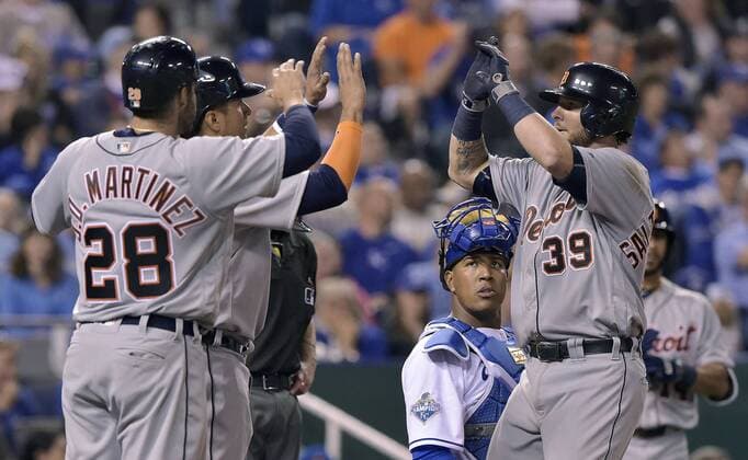 April 19, 2016 - Kansas City, MO, USA - The Detroit Tigers Jarrod Saltalamacchia (39) is congratulated by J.D. Martinez and Victor Martinez (28) in front of Kansas City Royals catcher Salvador Perez after a three-run home run in the seventh inning on Tuesday, April 19, 2016, at Kauffman Stadium in Kansas City, Mo. Detroit at Kansas City - ZUMAm67_