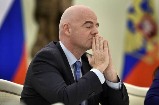 April 20, 2016 - Moscow, RUSSIA - FIFA President Gianni Infantino listens to Russian President Vladimir Putin at their meeting in the Kremlin in Moscow, Wednesday, April 20, 2016. Russia World Cup 2018 - ZUMAp124