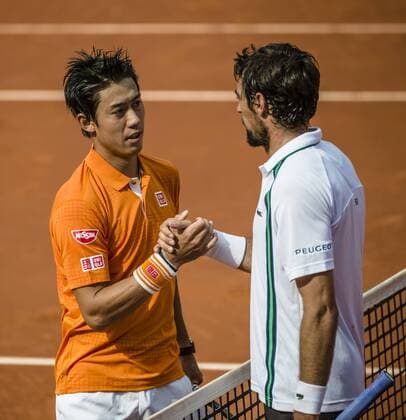 April 21, 2016 - Barcelona, Catalonia, Spain - KEI NISHIKORI (JAP) celebrates is congratulated by Jeremy Chardy (FRA) after their match in the 3rd round of the Barcelona Open Banc Sabadell 2016. Nishikori wins 6-3, 7-5 Nishikori Reaches Quarter Finals At Barcelona Open 2016 - ZUMAo105