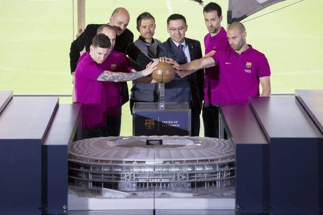 April 21, 2016 - Barcelona, Spain - Barcelona s Argentinian forward Lionel Messi, Barcelona s midfielder Andres Iniesta, Barcelona s Espai Barca (Barca Space) director Jordi Moix, Barcelona s coach Luis Enrique, Barcelona s president Josep Maria Bartomeu, Barcelona s midfielder Sergio Busquets and Barcelona s Argentinian defender Javier Mascherano push a ball to uncover a mockup of the New Camp Nou during the presentation of FC Barcelona Barca stadium s remodelling project, at the at the Camp Nou stadium in Barcelona, on April 21, 2016 New Camp Nou stadium maquet show - ZUMAn230