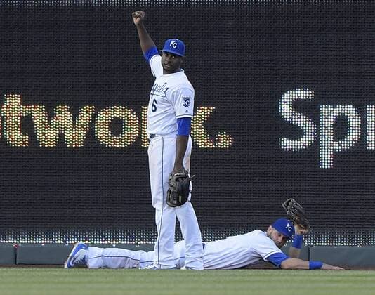 April 21, 2016 - Kansas City, MO, USA - Kansas City Royals left fielder Alex Gordon shows the ball in the glove as center fielder Lorenzo Cain signals a catch and out on the Detroit Tigers Justin Upton in the fourth inning on Thursday, April 21, 2016, at Kauffman Stadium in Kansas City, Mo. Detroit at Kansas City - ZUMAm67_