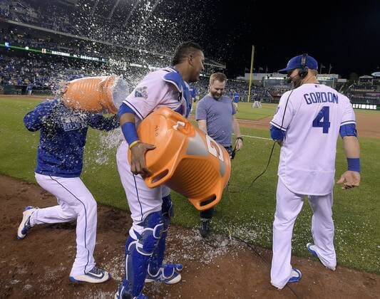 April 21, 2016 - Kansas City, MO, USA - The Kansas City Royals Salvador Perez gets a shower of his own from Drew Butera, left, after Perez doused Alex Gordon (4) with a Gatorade bucket following a 4-0 win against the Detroit Tigers on Thursday, April 21, 2016, at Kauffman Stadium in Kansas City, Mo. Detroit at Kansas City - ZUMAm67_
