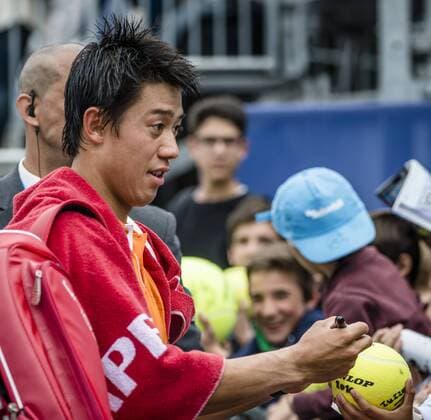 April 22, 2016 - Barcelona, Catalonia, Spain - KEI NISHIKORI (JAP) signs autographs after winning against Alexandr Dolgopolov (UKR) their quarter-final of the Barcelona Open Banc Sabadell 2016. Nishikori wins 7-5, 6-0 Nishikori Reaches Barcelona Open 2016 Semi Finals - ZUMAo105