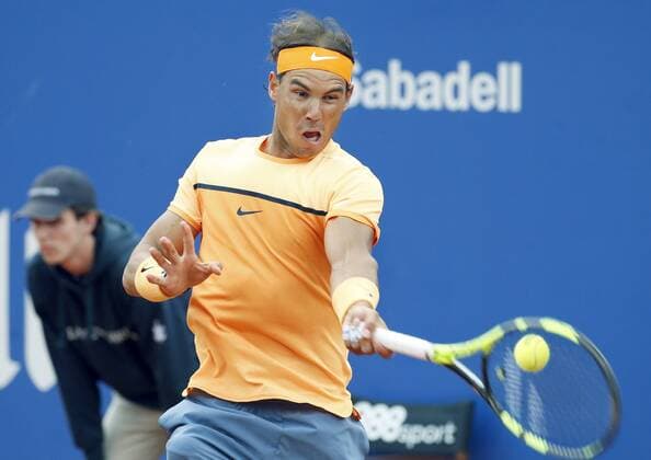 Tennis, Barcelona Open, Nadal - Fognini Spanish tennis player Rafael Nadal returns the ball to Italian Fabio Fognini during the Barcelona Open Banc Sabadell-Trofeo Conde de Godo quarter final match held at Real Club Tenis in Barcelona, Catalonia, Spain, 22 April 2016. NADAL VS FOGNINI !ACHTUNG: NUR REDAKTIONELLE NUTZUNG!  BCN005 20160422-635969525773453854