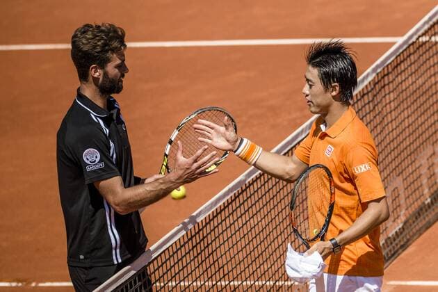 April 23, 2016 - Barcelona, Catalonia, Spain - KEI NISHIKORI of Japon is congratulated by Benoit Paire of France after winning the semi-final at the Barcelona Open Banc Sabadell 2016. Nishikori won 6:3, 6:2 Tennis 2016 - Barcelona Open - Day 6 - ZUMAo105