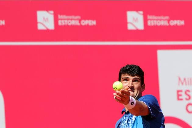 April 23, 2016 - Estoril, Portugal - Franko Skugor of Croatia serves a ball to Jo¹o Domingues of Portugal during the Qualifying of the Millennium Estoril Open ATP Tennis Herren 250 tennis tournament at the Clube de TÅ½nis do Estoril in Portugal on April 25, 2016. Millennium Estoril Open ATP 250 tennis tournament - Jo‹o Domingues (POR) vs Franko Skugor (CRO) - ZUMAf123