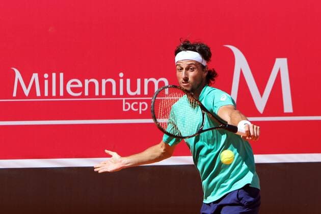 April 23, 2016 - Estoril, Portugal - Andrea Arnaboldi of Italy returns a ball to Gerard Granollers of Spain during the Qualifying of the Millennium Estoril Open ATP Tennis Herren 250 tennis tournament at the Clube de TÅ½nis do Estoril in Portugal on April 25, 2016. Millennium Estoril Open ATP 250 tennis tournament - Andrea Arnaboldi (ITA) vs Gerard Granollers (ESP) - ZUMAf123