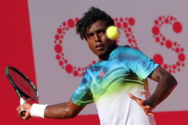 April 23, 2016 - Estoril, Portugal - Swedish Elias Ymer returns a ball to Portuguese Rui Machado during the Qualifying of the Millennium Estoril Open ATP Tennis Herren 250 tennis tournament at the Clube de TÃƒÂ©nis do Estoril in Portugal on April 25, 2016. Millennium Estoril Open ATP 250 tennis tournament - Rui Machado (POR) vs Elias Ymer (SWE) - ZUMAf123