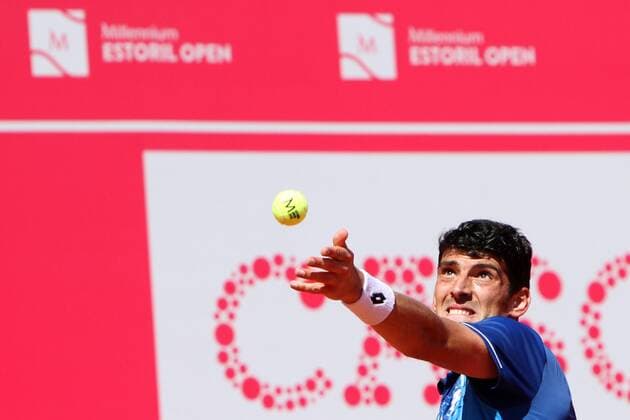April 23, 2016 - Estoril, Portugal - Franko Skugor of Croatia serves a ball to Joo Domingues of Portugal during the Qualifying of the Millennium Estoril Open ATP Tennis Herren 250 tennis tournament at the Clube de Tnis do Estoril in Portugal on April 25, 2016. Millennium Estoril Open  - ZUMAn230
