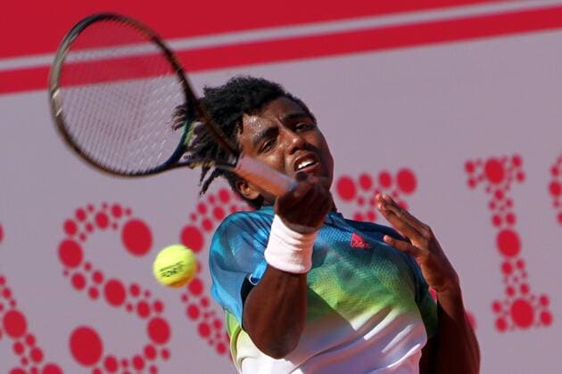 April 23, 2016 - Estoril, Portugal - Swedish Elias Ymer returns a ball to Portuguese Rui Machado during the Qualifying of the Millennium Estoril Open ATP Tennis Herren 250 tennis tournament at the Clube de Tnis do Estoril in Portugal on April 25, 2016. Millennium Estoril Open  - ZUMAn230