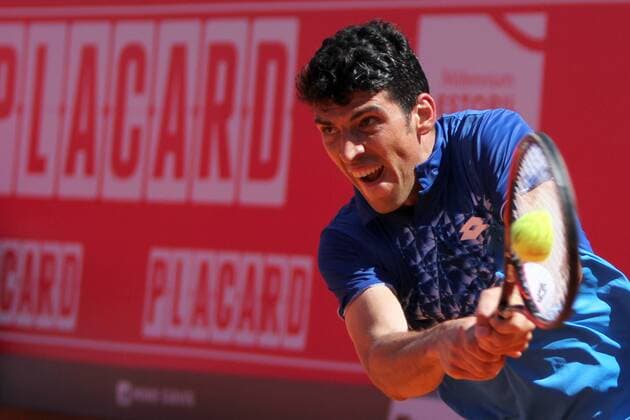 April 23, 2016 - Estoril, Portugal - Franko Skugor of Croatia returns a ball to Joo Domingues of Portugal during the Qualifying of the Millennium Estoril Open ATP Tennis Herren 250 tennis tournament at the Clube de Tnis do Estoril in Portugal on April 25, 2016. Millennium Estoril Open  - ZUMAn230