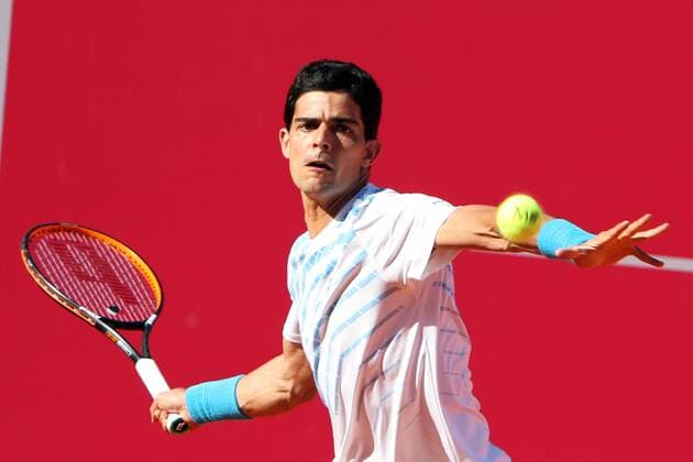 April 23, 2016 - Estoril, Portugal - Portuguese Rui Machado returns a ball to Swedish Elias Ymer during the Qualifying of the Millennium Estoril Open ATP Tennis Herren 250 tennis tournament at the Clube de Tnis do Estoril in Portugal on April 25, 2016. Millennium Estoril Open  - ZUMAn230
