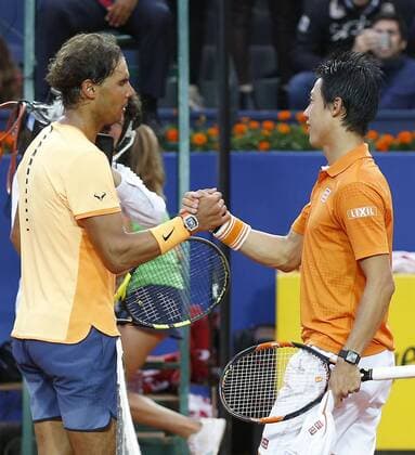 Tennis: Nadal defeats Nishikori in battle of Barcelona champions Spaniard Rafael Nadal (L) shakes hands with Kei Nishikori of Japan after his 6-4, 7-5 victory in the Barcelona Open final in the Spanish city on April 24, 2016. 