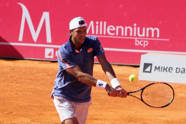 April 26, 2016 - Estoril, Portugal - Paul-Henri Mathieu of France returns a ball to Gastao Elias of Portugal during the Millennium Estoril Open ATP Tennis Herren 250 tennis tournament at the Clube de TÅ½nis do Estoril in Portugal on April 26, 2016. Paul-Henri Mathieu won 2-0 Millennium Estoril Open ATP 250 tennis tournament - Gastao Elias (POR) vs Paul-Henri Mathieu (FRA) - ZUMAf123
