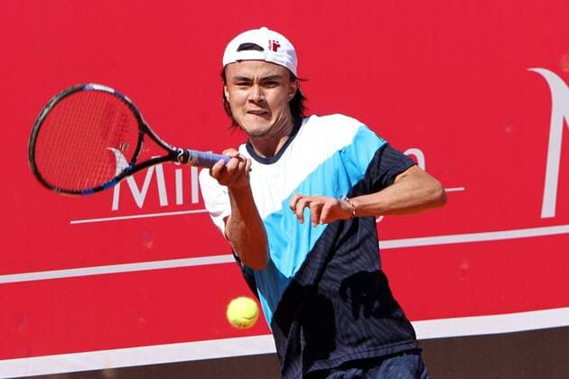 April 26, 2016 - Estoril, Portugal - Taro Daniel of Japan returns a ball to Steven Diez of Canada during the Millennium Estoril Open ATP Tennis Herren 250 tennis tournament at the Clube de TÅ½nis do Estoril in Portugal on April 26, 2016. Millennium Estoril Open ATP 250 tennis tournament - Taro Daniel (JAP) vs Steven Diez (CAN) - ZUMAf123