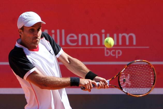 April 26, 2016 - Estoril, Portugal - Steven Diez of Canada returns a ball to Taro Daniel of Japan during the Millennium Estoril Open ATP Tennis Herren 250 tennis tournament at the Clube de TÅ½nis do Estoril in Portugal on April 26, 2016. Millennium Estoril Open ATP 250 tennis tournament - Taro Daniel (JAP) vs Steven Diez (CAN) - ZUMAf123