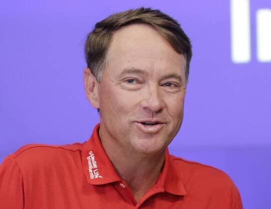 Ryder Cup Captain Davis Love III rings the opening bell at the Nasdaq in Times Square in New York City on April 28, 2016.  NYP20160428114 JOHNxANGELILLO