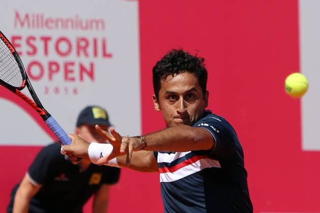 April 28, 2016 - Estoril, Portugal - Spanish Nicolas Almagro returns a ball to Portuguese Jo¹o Sousa during the Millennium Estoril Open ATP Tennis Herren 250 tennis tournament at the Clube de Tenis do Estoril in Portugal on April 27, 2016. Millennium Estoril Open ATP 250 tennis tournament - Jo‹o Sousa (POR) vs Spanish Nicolas Almagro (ESP) - ZUMAf123