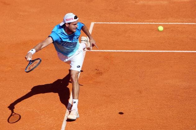 April 28, 2016 - Estoril, Portugal - Portuguese Joao Sousa returns a ball to Spanish Nicolas Almagro during the Millennium Estoril Open ATP Tennis Herren 250 tennis tournament at the Clube de Tenis do Estoril in Portugal on April 27, 2016. Millennium Estoril Open ATP 250 tennis tournament - Jo‹o Sousa (POR) vs Spanish Nicolas Almagro (ESP) - ZUMAf123