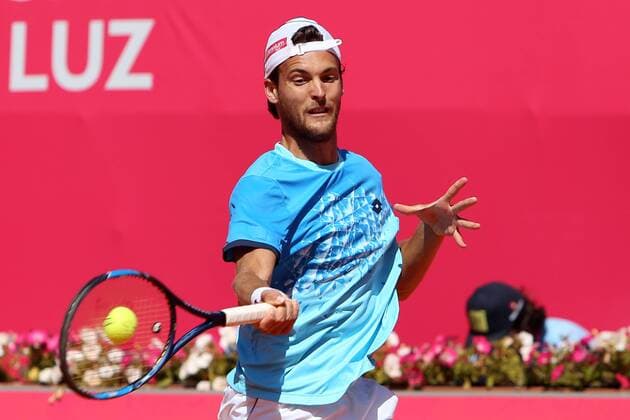 April 28, 2016 - Estoril, Portugal - Portuguese Joao Sousa returns a ball to Spanish Nicolas Almagro during the Millennium Estoril Open ATP Tennis Herren 250 tennis tournament at the Clube de Tenis do Estoril in Portugal on April 27, 2016. Millennium Estoril Open ATP 250 tennis tournament - Jo‹o Sousa (POR) vs Spanish Nicolas Almagro (ESP) - ZUMAf123