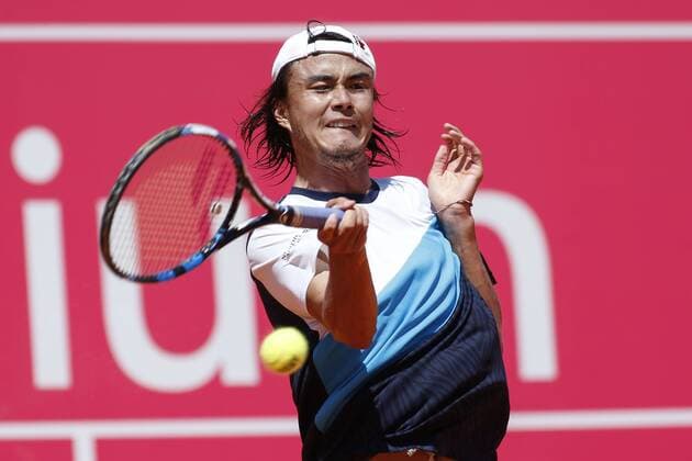 Portugal : Pablo Carreno Busta wins for 6-4, 7-5 against Taro Daniel during the Estoril Open Tournament Taro Daniel of Japan in action against Pablo Carreno Busta of Spain during their second round match for the Estoril Open tennis tournament where Busta won at 6-4, 7-5  FilipexAmorim
