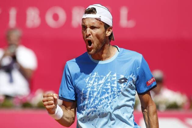 Portugal : Nicolas Almagro won at Estoril Open tournament Joao Sousa of Portugal in action against Nicolas Almagro of Spain during his second round match for the Estoril Open tennis tournament. Nicolas Almagro won with the score of 6-1,6-2.  FilipexAmorim