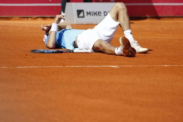 Portugal : Nicolas Almagro won at Estoril Open tournament Joao Sousa of Portugal gets injured during the match against Nicolas Almagro of Spain during his second round match for the Estoril Open tennis tournament. Nicolas Almagro won with the score of 6-1,6-2.  FilipexAmorim