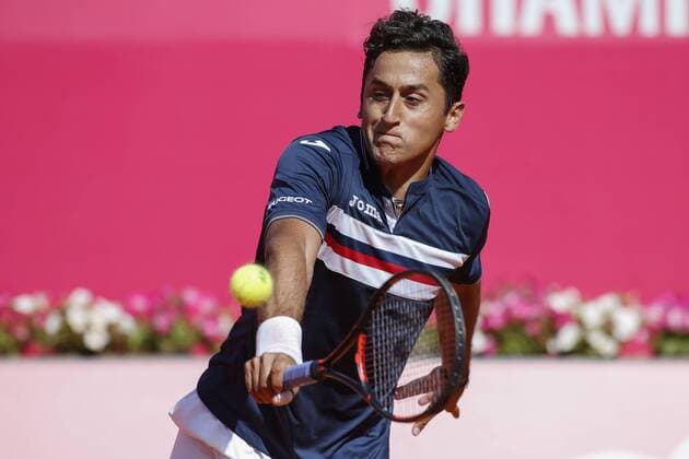 Portugal : Nicolas Almagro won at Estoril Open tournament Nicolas Almagro of Spain in action against Joao Sousa of Portugal during his second round match for the Estoril Open tennis tournament, where he won with the score of 6-1,6-2.  FilipexAmorim