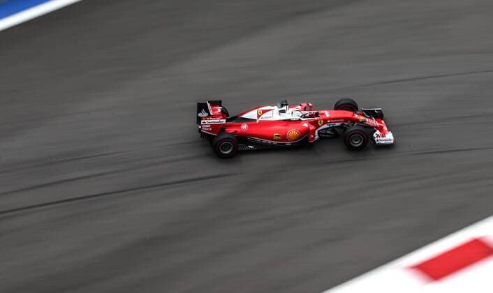 SOCHI, RUSSIA. APRIL 30, 2016. Ferrari driver Serbastian Vettle of Germany steers his car in the third practice session of the 2016 Formula One Russian Grand Prix at the Sochi Autodrom Circuit. Sergei Bobylev TASS  TS02157A