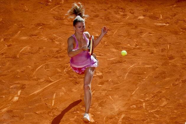 Italian tennis player Camila Giorgi returns the ball to compatriot Sara Errani during the first round match of the Mutua Madrid Open played at the Caja Magica court in Madrid, Spain, 30 April 2016. The Mutua Madrid Open runs from 29 April to 08 May 2016. Camila Giorgi vs Sara Errani !ACHTUNG: NUR REDAKTIONELLE NUTZUNG!  20160430-635976444903272164