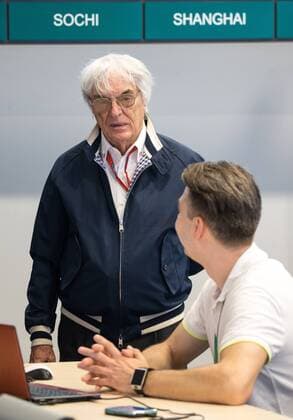 SOCHI, RUSSIA. MAY 1, 2016. Bernard Charles Bernie Ecclestone (background), president of the Formula One Management and Formula 1 Administration (FOA), talks to journalists at a press center. Sergei Bobylev TASS  TS0216C5