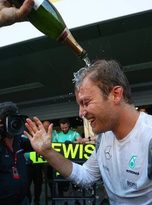 SOCHI, RUSSIA. MAY 1, 2016. Winner Mercedes driver Nico Rosberg of Germany splashed with champagne as he and Mercedes team members celebrate after the podium ceremony for the 2016 Formula One Russian Grand Prix at the Sochi Autodrom Circuit. Sergei Bobylev TASS  TS02183D
