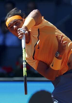 Spanish tennis player Rafael Nadal returns the ball to Russian Andrey Kuznetsov during their Mutua Madrid Open tennis tournament second round match at the Caja Magica Tennis Center in Madrid, Spain, 03 May 2016. The Mutua Madrid Open runs from 29 April until 08 May 2016. RAFAEL NADAL VS ANDREY KUZNETSOV !ACHTUNG: NUR REDAKTIONELLE NUTZUNG!  GRA256 20160503-635978911556882486