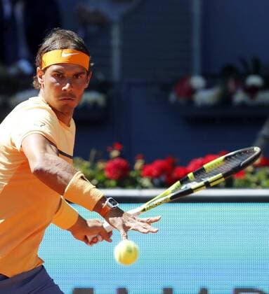 Spanish tennis player Rafael Nadal returns the ball to Russian Andrey Kuznetsov during their Mutua Madrid Open tennis tournament second round match at the Caja Magica Tennis Center in Madrid, Spain, 03 May 2016. The Mutua Madrid Open runs from 29 April until 08 May 2016. RAFAEL NADAL VS ANDREY KUZNETSOV !ACHTUNG: NUR REDAKTIONELLE NUTZUNG!  GRA256 20160503-635978911567022486