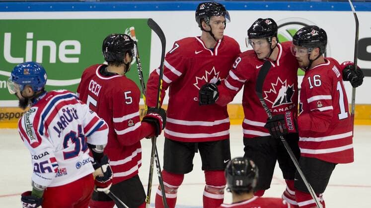 Richard Jarusek (CZE), from left, pass by as Cody Ceci, Michael Matheson, Max Domi (CAN) celebrate during the friendly match Czech Republic vs Canada in Prague, Czech Republic, on Tuesday, May 3, 2016. (CTKxPhoto MichalxKamaryt) CTKPhotoP201605030957301  kmt 7