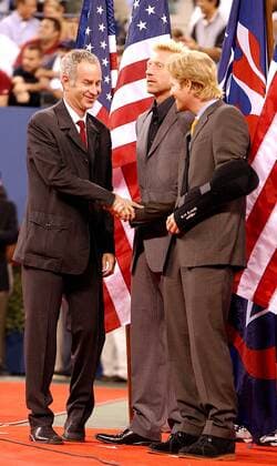 JOHN MCENROE, BORIS BECKER AND JIM COURIER.K32407AR.PETE SAMPRAS HONORED WITH TRIBUTE AT COURTSIDE AFTER HIS ANNOUNCEMENT OF RETIREMENT FROM TENNIS. .AT THE 2003 US OPEN TENNIS TOURNAMENT IN FLUSHING, QUEENS. NEW YORK New York.8 25 2003. 2003 PETE SAMPRAS US OPEN AR - ZUMAg115