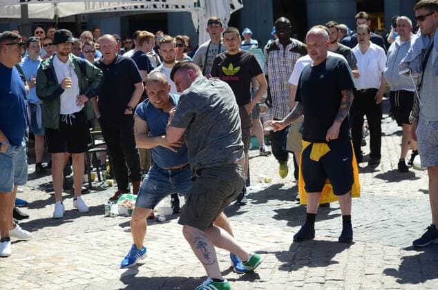 Manchester City fans fight among themselves Two Manchester City fans pictured hitting each other in Madrid. Nearly 10,000 Manchester City fans travel to Madrid to watch the semi-final UEFA Champions League match between Real Madrid (Spain) and Manchester City F.C (England). Supporters congregate in the streets around Plaza Mayor in central Madrid prior the game.  JORGExSANZxGARCIA