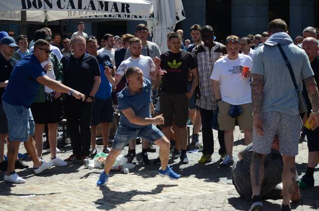 Manchester City fans fight among themselves Two Manchester City fans pictured hitting each other in Madrid. Nearly 10,000 Manchester City fans travel to Madrid to watch the semi-final UEFA Champions League match between Real Madrid (Spain) and Manchester City F.C (England). Supporters congregate in the streets around Plaza Mayor in central Madrid prior the game.  JORGExSANZxGARCIA
