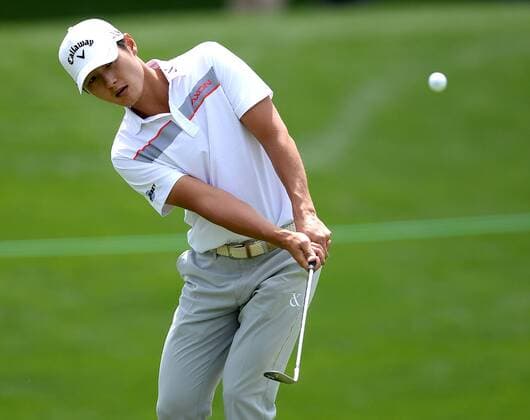 May 4, 2016 - Charlotte, NC, USA - Danny Lee chips onto the 18th green during a Pro-Am at Quail Hollow Club in Charlotte, N.C., on Wednesday, May 4, 2016. Wells Fargo Pro-Am - ZUMAm67_