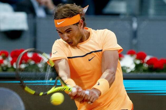 Spanish tennis player Rafa Nadal returns a ball to US Sam Querrey during their Mutua Madrid Open tennis tournament round of 16 match at the Caja Magica Tennis Center in Madrid, Spain, 05 May 2016. The Mutua Madrid Open runs from 29 April until 08 May 2016. Rafa Nadal vs Sam Querrey !ACHTUNG: NUR REDAKTIONELLE NUTZUNG!  20160505-635980786499902916