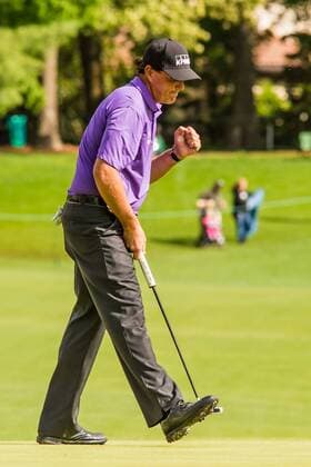 Golfer Phil Mickelson gives a fist pump after making a long put on the 14th green during the PGA Golf Herren Wells Fargo Championship on Thursday, May 5, 2016 at Quail Hallow Country Club in Charlotte, NC. David Grooms CSM PGA 2016: Wells Fargo Championship MAR 5 - ZUMAc04_