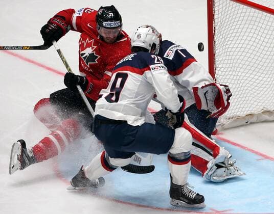 ST. PETERSBURG, RUSSIA. MAY 6, 2016. United States goalie Keith Kinkaid, Jake McCabe defend against Canada s Boone Jenner (R-L) in their 2016 IIHF World Championship WM Weltmeisterschaft Preliminary Round Group B Ice hockey Eishockey match at the Yubileyny Sports Palace. Sergei Savostyanov TASS  TS021D6A