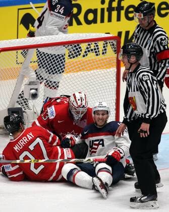 ST. PETERSBURG, RUSSIA. MAY 6, 2016. Canada s Ryan Murray, goalie Cam Talbot and United States Jordan Schroeder (L-R) lying on ice in their 2016 IIHF World Championship WM Weltmeisterschaft Preliminary Round Group B Ice hockey Eishockey match at the Yubileyny Sports Palace. Team Canada won the game 5-1. Sergei Savostyanov TASS  TS021D91