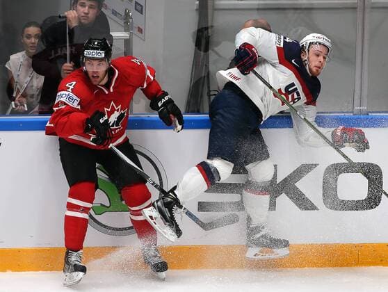 ATTENTION EDITORS! IN PHOTO TS021D90 SENT MAY 6, 2016 THE CAPTION INCORRECTLY IDENTIFIED THE PHOTOGRAPHER. THE CORRECTED CAPTION FOLLOWS: ST. PETERSBURG, RUSSIA. MAY 6, 2016. Canada s Taylor Hall (L) and United States Hudson Fasching fight for the puck in their 2016 IIHF World Championship WM Weltmeisterschaft Preliminary Round Group B Ice hockey Eishockey match at the Yubileyny Sports Palace. Team Canada won the game 5-1. Sergei Savostyanov TASS WE REGRET ANY INCONVENIENCE  X0000C10