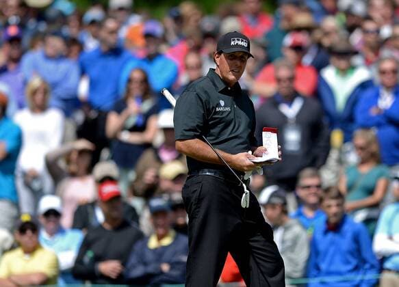 May 5, 2016 - Charlotte, NC, USA - Phil Mickelson checks his yardage book as he walks onto the third green during second round action of the Wells Fargo Championship at Quail Hollow Club on May 6, 2016 in Charlotte, N.C. Mickelson finished the round at -5. Wells Fargo Championship - ZUMAm67_