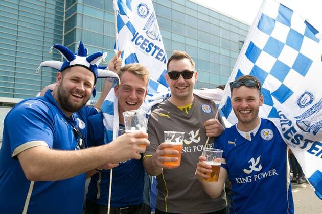 May 7, 2016 - Leicester, Leicestershire, UK - Leicester, UK. Leicester City fans celebrating outside the King Power stadium before their match with Everton before lifting the Premiership trophy. Pictured, fans celebrating. Leicester City Premier League Coronation  - ZUMAl94_