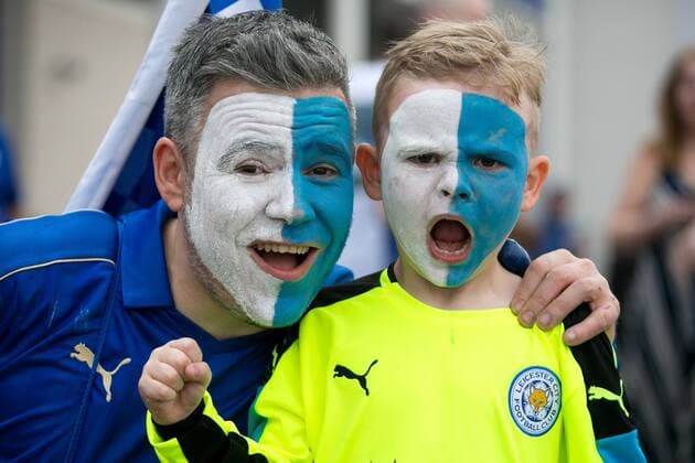 May 7, 2016 - Leicester, Leicestershire, United Kingdom - Leicester City fans celebrating outside the King Power stadium before their match with Everton. Five days after winning their first top-flight title in 132 years of existence, Leicester City will be presented with the Premier League trophy after Saturday’s final home game of the season, against Everton. Leicester City Premier League Coronation  - ZUMAl94_