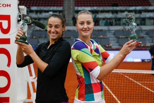 French tennis players Caroline Garcia (L) and Kristina Mladenovic (R) jubilate the victory against Sania Mirza and Martina Higins during their Mutua Madrid Open double female final match played at Caja Magica tennis complex in Madrid, Spain, on 07 May 2016. Garcia and Mladenovic won 6-4 and 6-4. Caroline Garcia and Kristina Mladenovic vs Sania Mirza and Martina Higins !ACHTUNG: NUR REDAKTIONELLE NUTZUNG!  20160507-635982425348787464