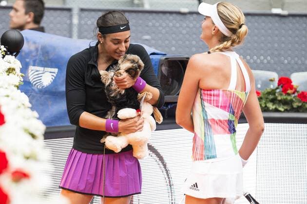 French Caroline Garcia with her dog and French Kristina Mladenovic during Doubles Woman Final Mutua Madrid Open Tennis 2016 in Madrid, May 07, 2016.  (20160507045)